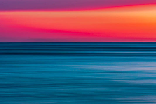 Image of Fire and Ice Fine Art Print featuring a beautiful pink, purple, yellow and blue Hawaiian sunset